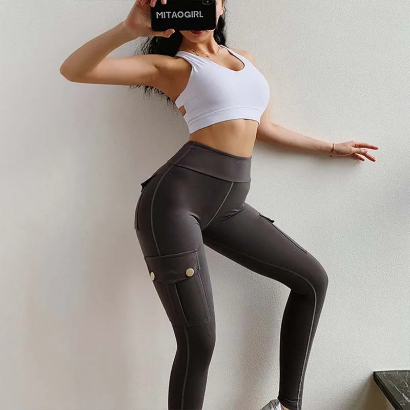 🔥Blowout-försäljning - 52% AV🔥Kvinnors ficka sexiga stretch leggings fitness träningsbyxor （🔥🔥BYGG 2 GRATIS FRAKT)